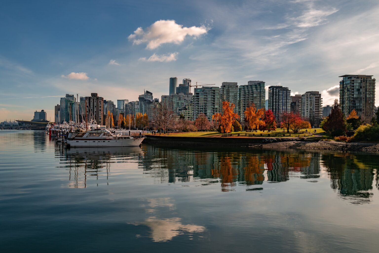 VANCOUVER, CANADA - Nov 13, 2019: A beautiful shot of the boats parked near the Coal Harbour in Vancouver